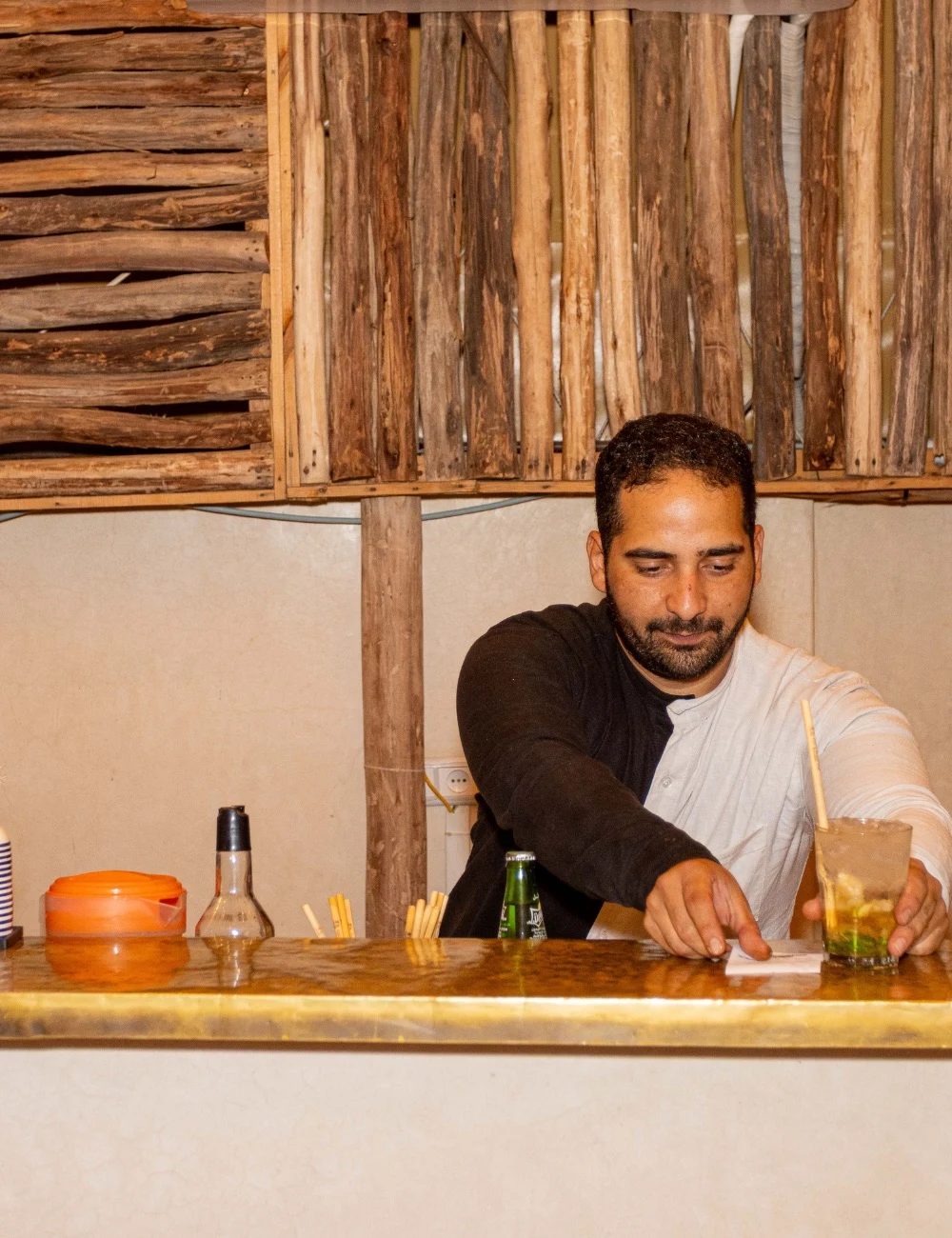 Bartender preparing a mocktail at the rooftop bar